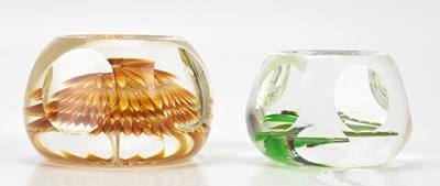 Lot 265 - PERTHSHIRE; two faceted glass paperweights...
