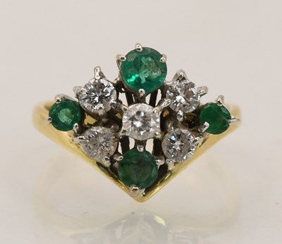 Lot 1367 - An 18ct yellow gold diamond and emerald...