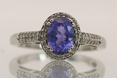 Lot 1439 - A platinum ring with a large oval cut...