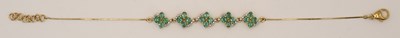 Lot 1556 - A 9ct yellow gold fancy bracelet featuring...