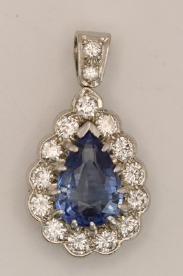 Lot 1463 - An 18ct white gold sapphire and diamond...