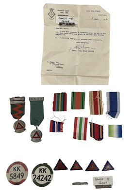 Lot 437 - A collection of bus drivers' medallions and...