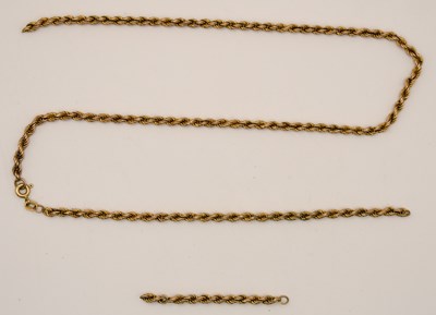 Lot 1480 - A 9ct yellow gold rope twist necklace (cut),...