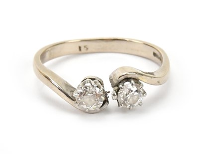 Lot 563 - An 18ct yellow and white gold diamond...