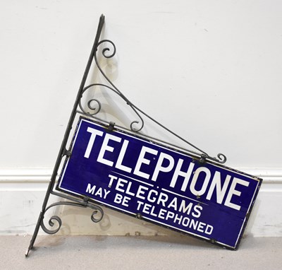 Lot 111 - An original double sided enamel sign...