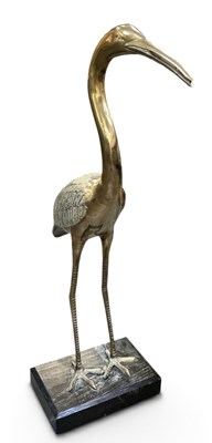 Lot 844 - A modern decorative brass figure of a crane,...