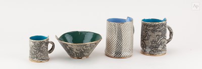 Lot 663 - VANESSA CONYERS; a pair of earthenware mugs...