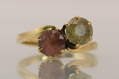 Lot 1455 - An unmarked yellow gold dress ring, with...