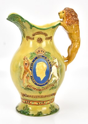 Lot 1371 - CROWN DEVON; an unusual musical coronation jug,...