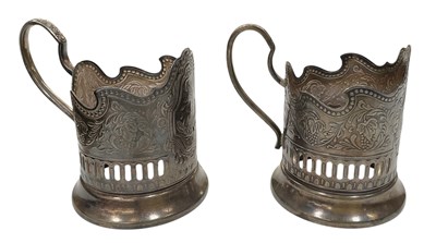 Lot 1100 - A pair of early 20th century silver plated mug...