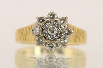 Lot 1398 - An 18ct yellow gold diamond floral cluster...