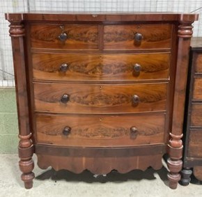 Lot 657 - A 19th century mahogany bowfront chest of two...