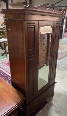 Lot 647 - An Edwardian single door glazed wardrobe, with...
