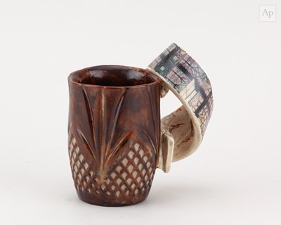 Lot 74 - CAROL McNICOLL (1943-2025); an earthenware mug...