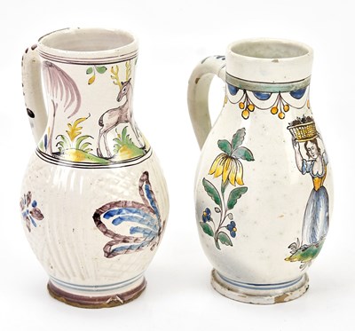 Lot 1326 - Two 19th century German faience ware steins...
