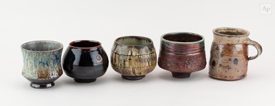 Lot 685 - A group of stoneware and raku teabowls by...
