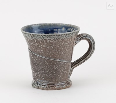 Lot 671 - WALTER KEELER (born 1942); a salt glazed mug,...