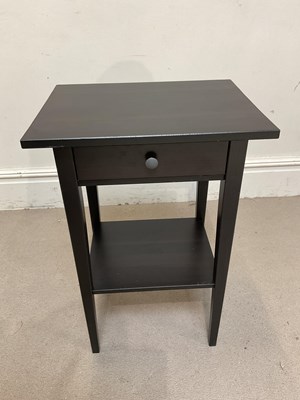 Lot 39 - A contemporary ebonised side table.