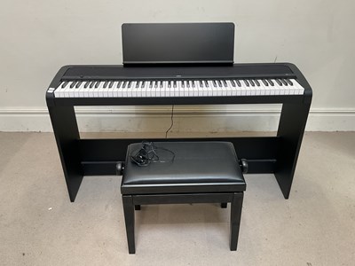 Lot 640 - KORG; a modern Model:B2 electric keyboard,...