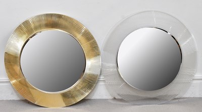 Lot 16 - A near pair of modern circular wall mirrors...