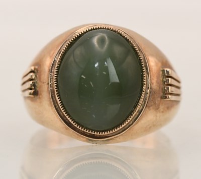 Lot 1390 - A Chinese yellow metal nephrite jade set...