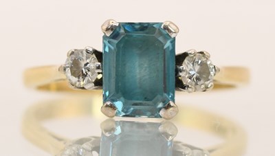 Lot 1374 - An 18ct yellow gold blue zircon and diamond...