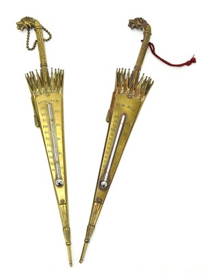 Lot 252 - A pair of brass thermometers in the form of...