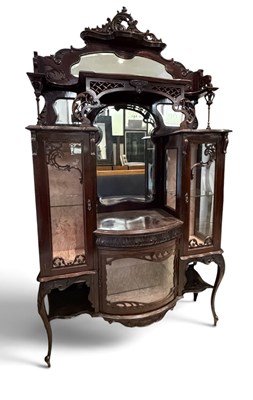 Lot 60 - A late 19th/early 20th century carved mahogany...