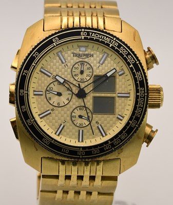 Lot 1815 - TRIUMPH; a modern gentleman's gold plated...