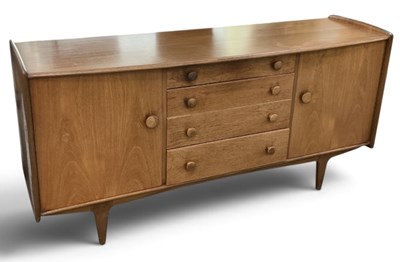 Lot 28 - JOHN HERBERT FOR A YOUNGER LTD; a teak mid...