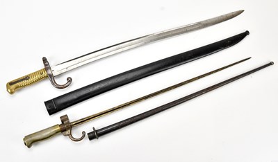 Lot 1079 - An 1866 Chassepot bayonet, with scabbard,...