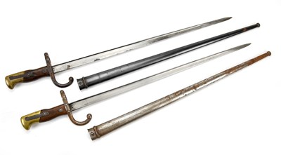 Lot 1107 - Two 1878 bayonets, comprising a St. Etienne...