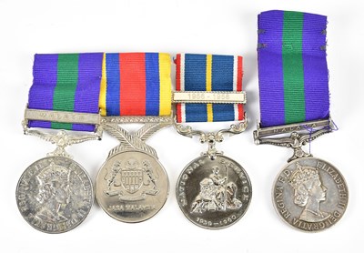 Lot 1157 - A Malayan medal group to J D P Heller R A F,...
