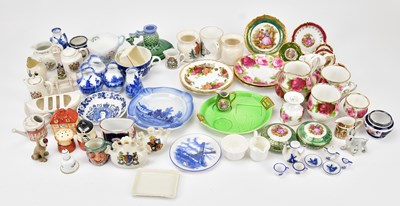 Lot 1356 - A collection of miniature ceramic items,...