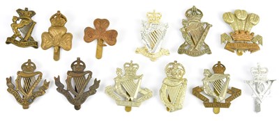 Lot 1222 - IRISH REGIMENTAL INTEREST; twelve military cap...