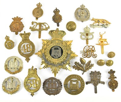 Lot 1152 - A good and large collection of military cap...