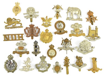 Lot 1223 - A large collection of military cap badges...