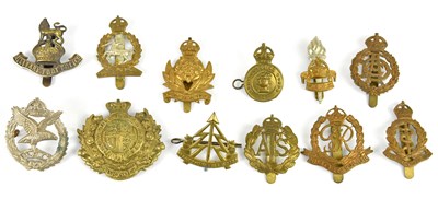 Lot 1182 - A large collection of military cap badges...
