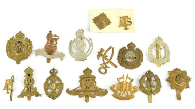 Lot 1183 - A large collection of military cap badges...