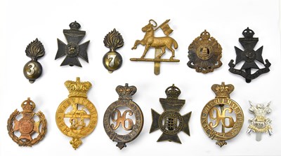 Lot 1179 - A collection of assorted military cap badges...