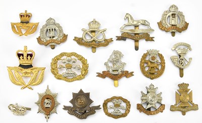 Lot 1180 - A collection of assorted military cap badges...