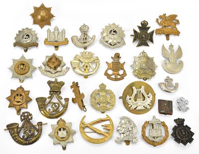 Lot 1159 - A large collection of assorted military cap...