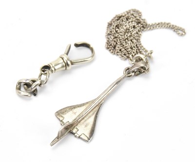 Lot 614 - A sterling silver pendant formed as Concorde...