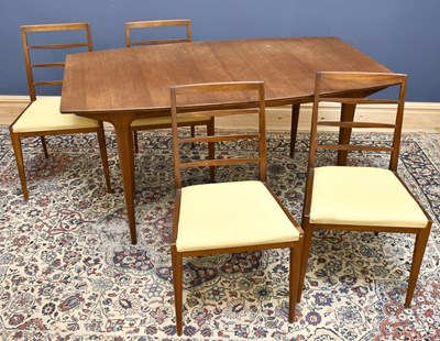 Lot 1421 - MCINTOSH; a teak mid century dining table and...
