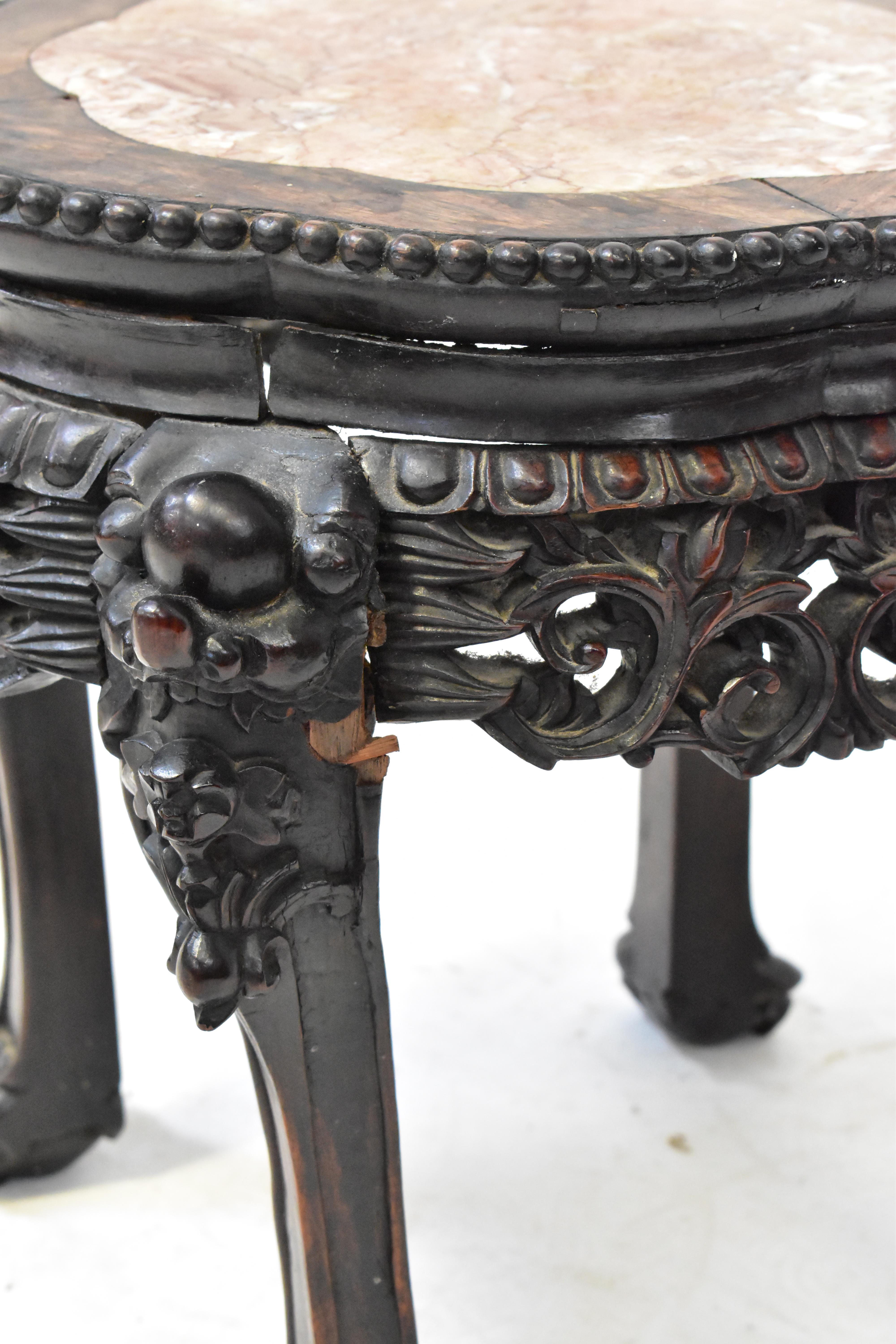 Lot 74 - A Chinese rosewood marble-topped jardinière