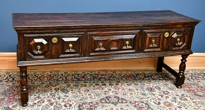 Lot 2534 - A 17th century Jacobean style oak dresser base,...