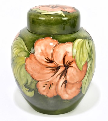 Lot 1769 - MOORCROFT; a ginger jar and cover in the...