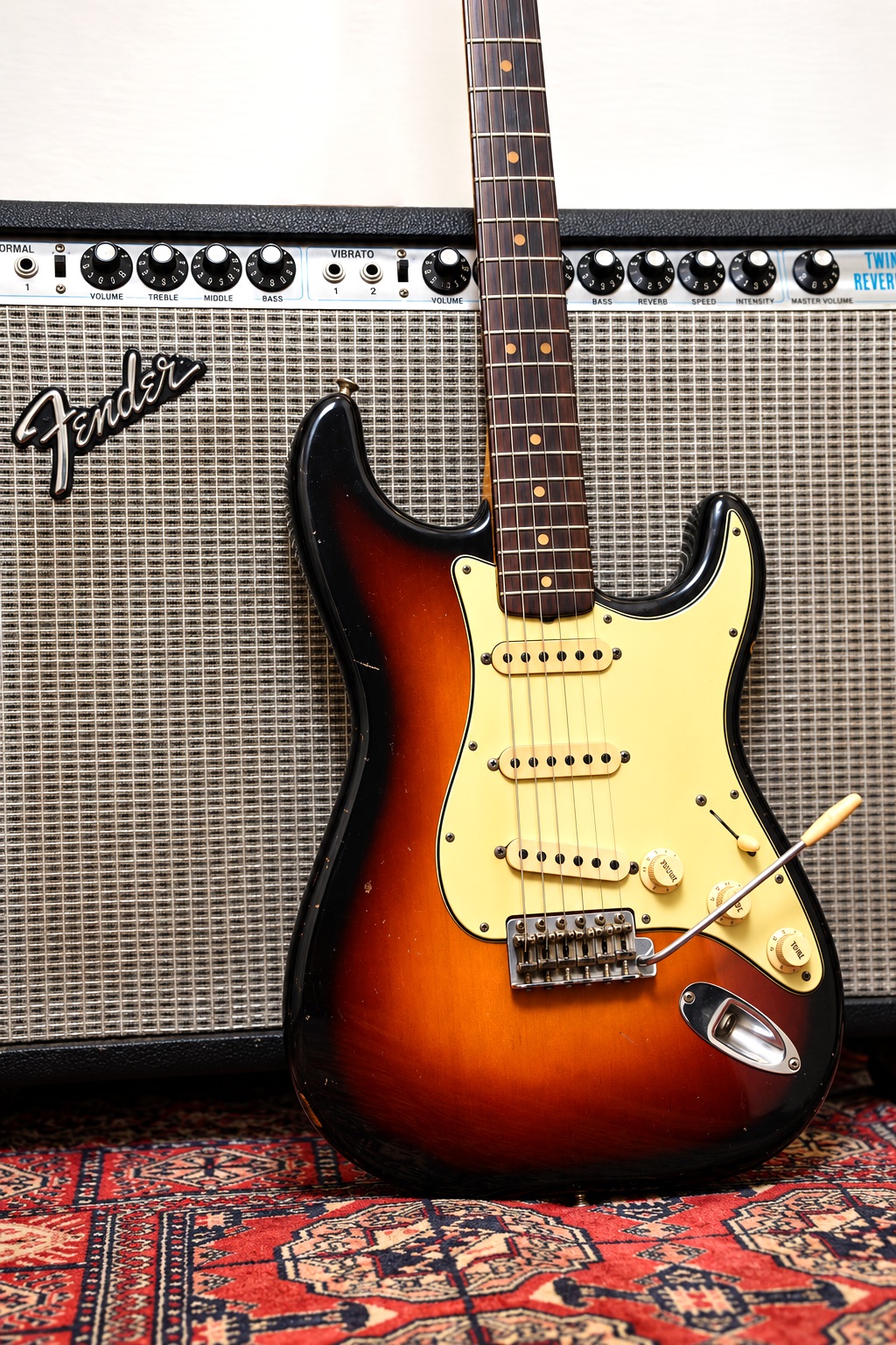 FENDER; a 1964 Stratocaster, sunburst finish, serial