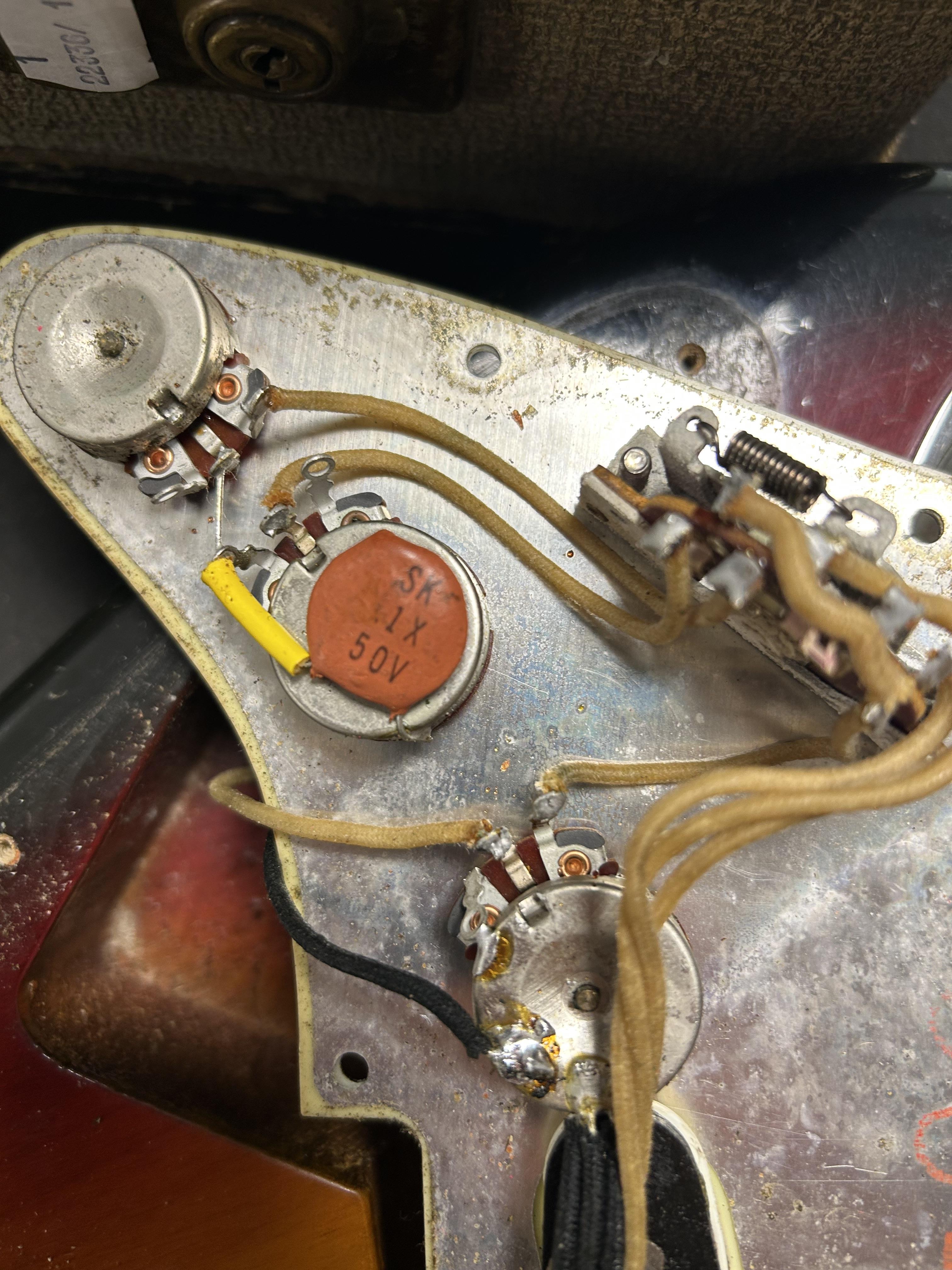 FENDER; a 1964 Stratocaster, sunburst finish, serial