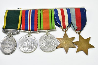 Lot 486 - A WWII group of five medals, named to SGT...